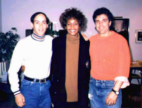 Allan Rich (left), Whitney Houston and Jud Friedman (right) at the studio for the "Run To You" session