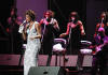 American pop singer Whitney Houston sings during a concert in the Olympic Sports Center in Beijing, capital of China, Sunday, July 25, 2004. The concert, part of Houston's China tour, drew more than 20,000 audience.