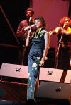 American pop singer Whitney Houston sings during a concert in the Olympic Sports Center in Beijing, capital of China, Sunday, July 25, 2004. The concert, part of Houston's China tour, drew more than 20,000 audience.